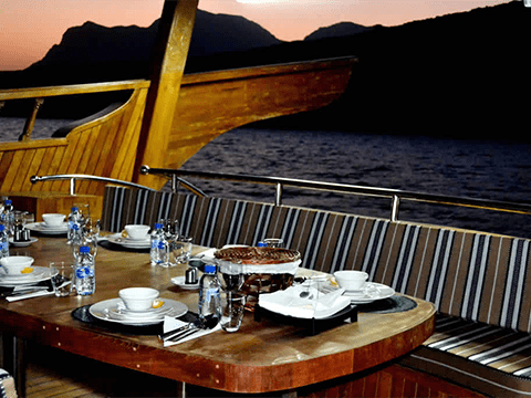 Khasab Overnight Dhow Cruise and Half Day Mountain Safari 