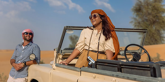 Safari through the desert in a vintage Land Rover