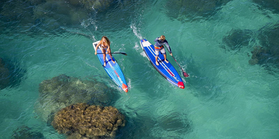 Bask in the sunshine on a stand-up paddleboard