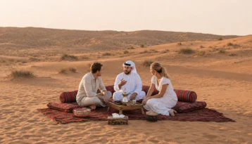 Emirati guide leading guests on a private cultural tour in Abu Dhabi