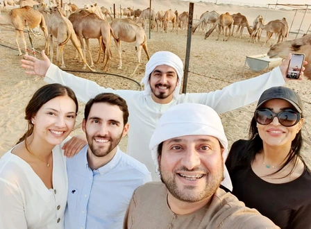Arabiers driver-guide welcoming guests during a private Abu Dhabi desert experience