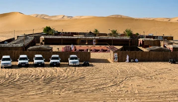Desert camp setup featured in a private Abu Dhabi tour package