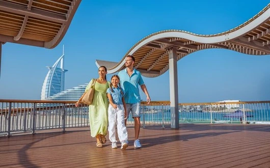 Family enjoying a private city tour in Dubai with Arabiers Holidays sightseeing guide