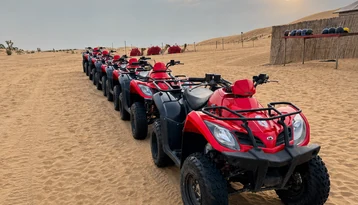 Quad bikes lined up for a sunset safari in the Abu Dhabi desert