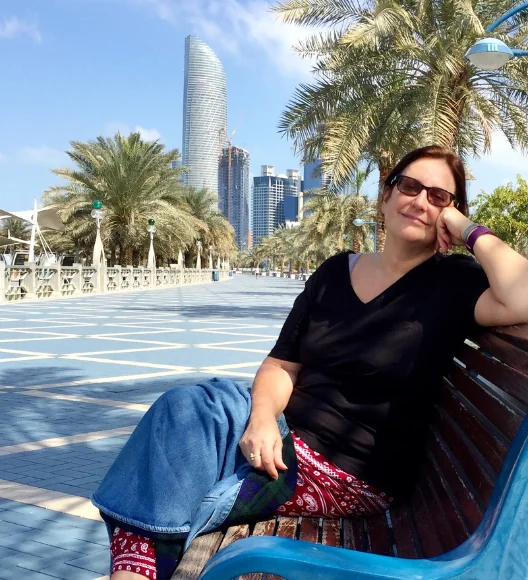 Tourists taking selfie near luxury yacht marina in the UAE
