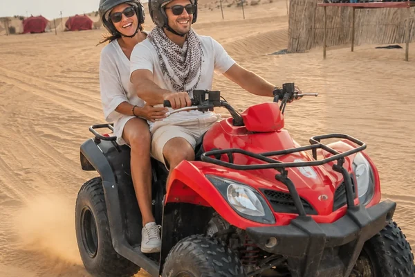 Quad bikes at sunset in the Abu Dhabi desert
