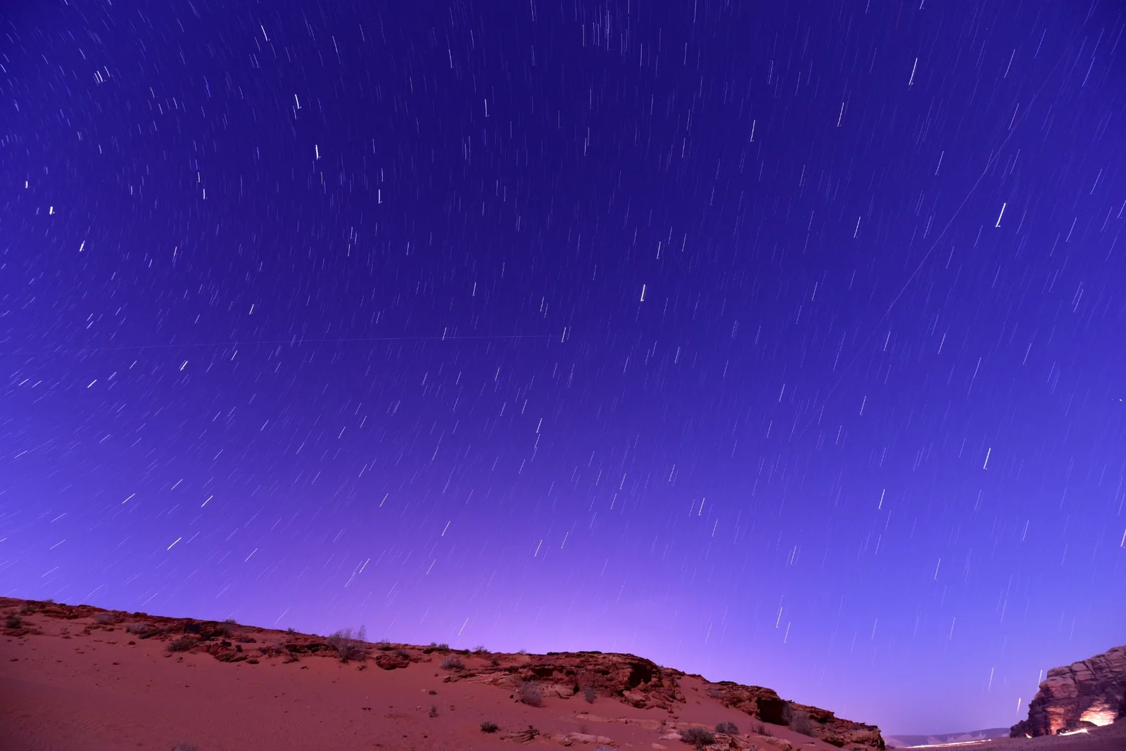 Star trails above a desert viewpoint near Al Ain