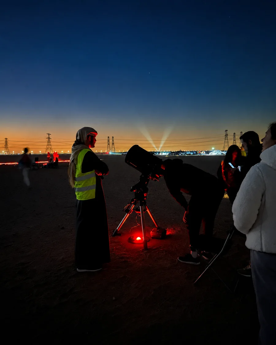 Mahmood Hasan guiding guests during a telescope observation session