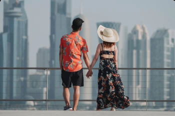 Couple viewing the Abu Dhabi skyline during a fourteen to eighteen-hour layover tour
