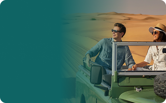 Travellers enjoying an Abu Dhabi desert stopover tour