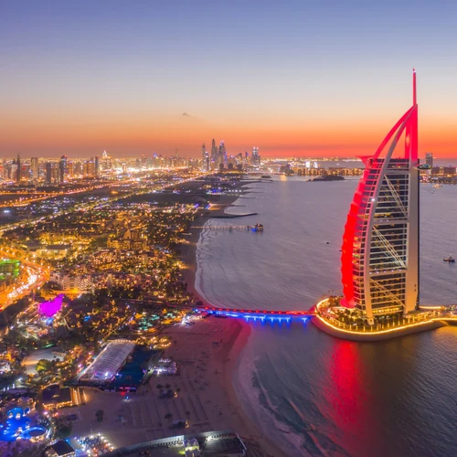 Dubai skyline and Sheikh Zayed Grand Mosque, the two halves of the Dubai and Abu Dhabi tour package