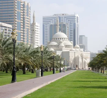 Sharjah city mosque and palm-lined park, Sharjah Tourist Visa guide by Martin Muthugumi for Arabiers