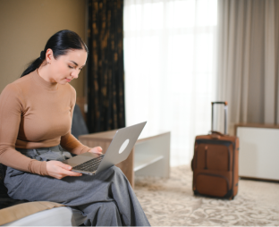 Traveller paying for a Brazil hotel booking online with a card through Arabiers Dubai support
