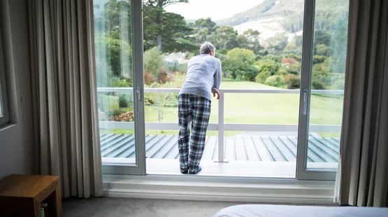 UAE couple at a Queenstown lakeside hotel with mountains behind