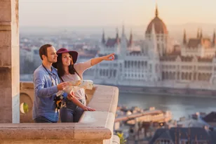 Travellers overlooking a European city landmark for Europe hotel booking support by Arabiers UAE travel agency
