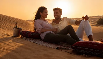 Private Liwa sunset experience on golden Empty Quarter dunes during the Liwa Sunset Champagne Tour