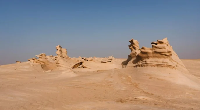 Wide view of the protected Al Wathba fossil dune formations