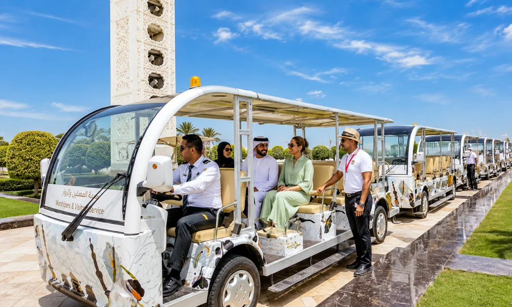 A couple viewing an armoured horse display inside Louvre Abu Dhabi