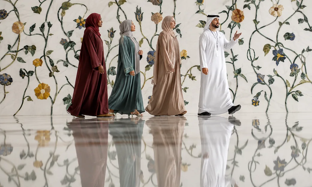 Visitors joining a guided palace hall visit at Qasr Al Watan