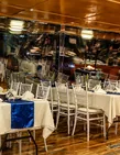 Air-conditioned lower deck dining area aboard the Yas Island dinner dhow