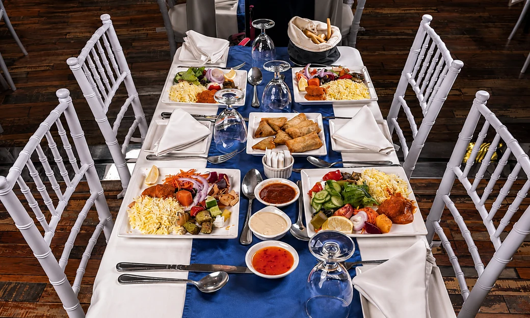 Dinner table prepared for guests aboard the Yas Marina dhow