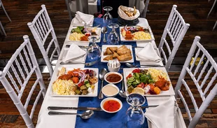 Dinner table prepared aboard the Yas Marina dhow