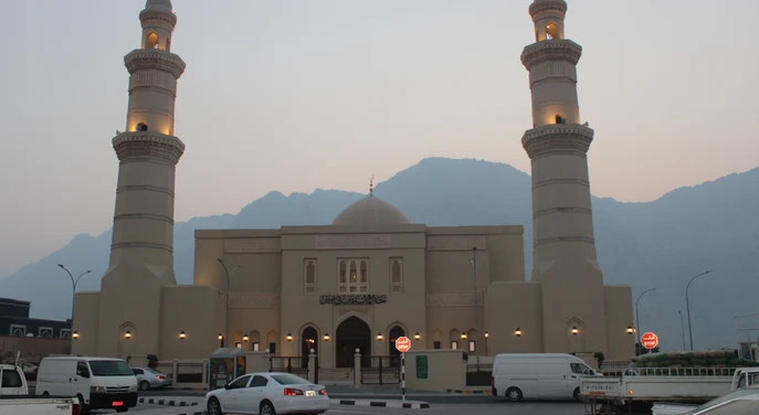 Mosque in Khasab at dusk with the Musandam mountains in the background