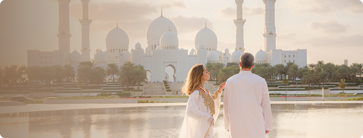Visitors experiencing the atmosphere of Sheikh Zayed Grand Mosque