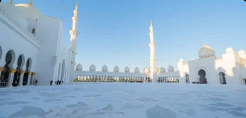 Sheikh Zayed Grand Mosque courtyard and white minarets in Abu Dhabi