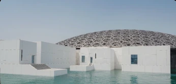 Louvre Abu Dhabi museum beneath its geometric dome on Saadiyat Island