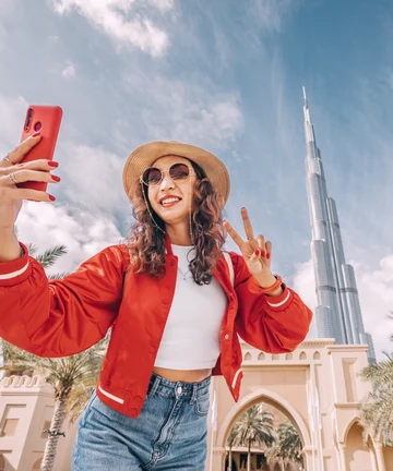 Haiti traveller visiting Dubai with Burj Khalifa, UAE visa guide 2026