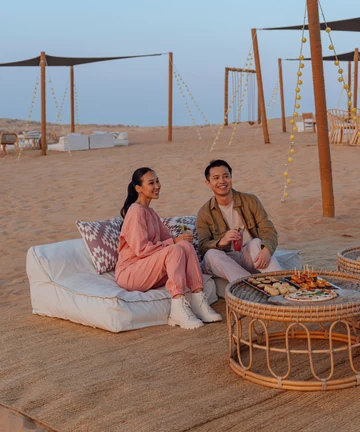 Indonesian travellers enjoying a Dubai desert camp, UAE visa guide 2026