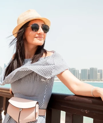 Canadian traveller in the UAE with Dubai skyline, Dubai visa from Canada 2026