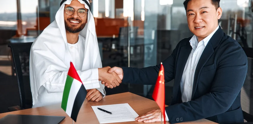 Diagram showing China visa requirements for UAE residents are set by passport nationality while UAE residence only decides where you apply