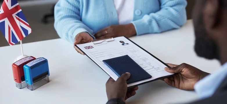 Passport, Emirates ID and 28-day UAE bank statement prepared for a UK visa application from Dubai