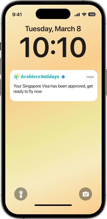 Singapore visit visa approval notification from Arabiers Holidays displayed on a smartphone for travellers applying from Dubai