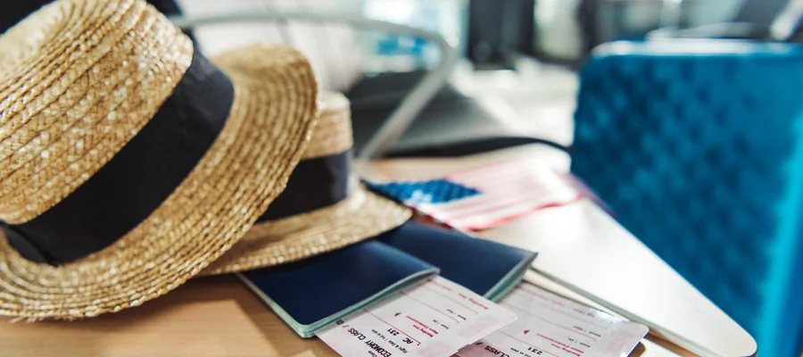 Passport and travel tickets prepared for a Thailand trip from Dubai