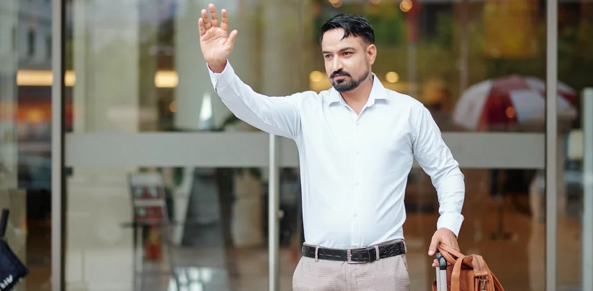 A UAE resident departing Dubai International Airport for India on a tourist visa